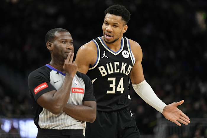 Milwaukee Bucks forward Giannis Antetokounmpo (34) argues with referee James Williams (60) 